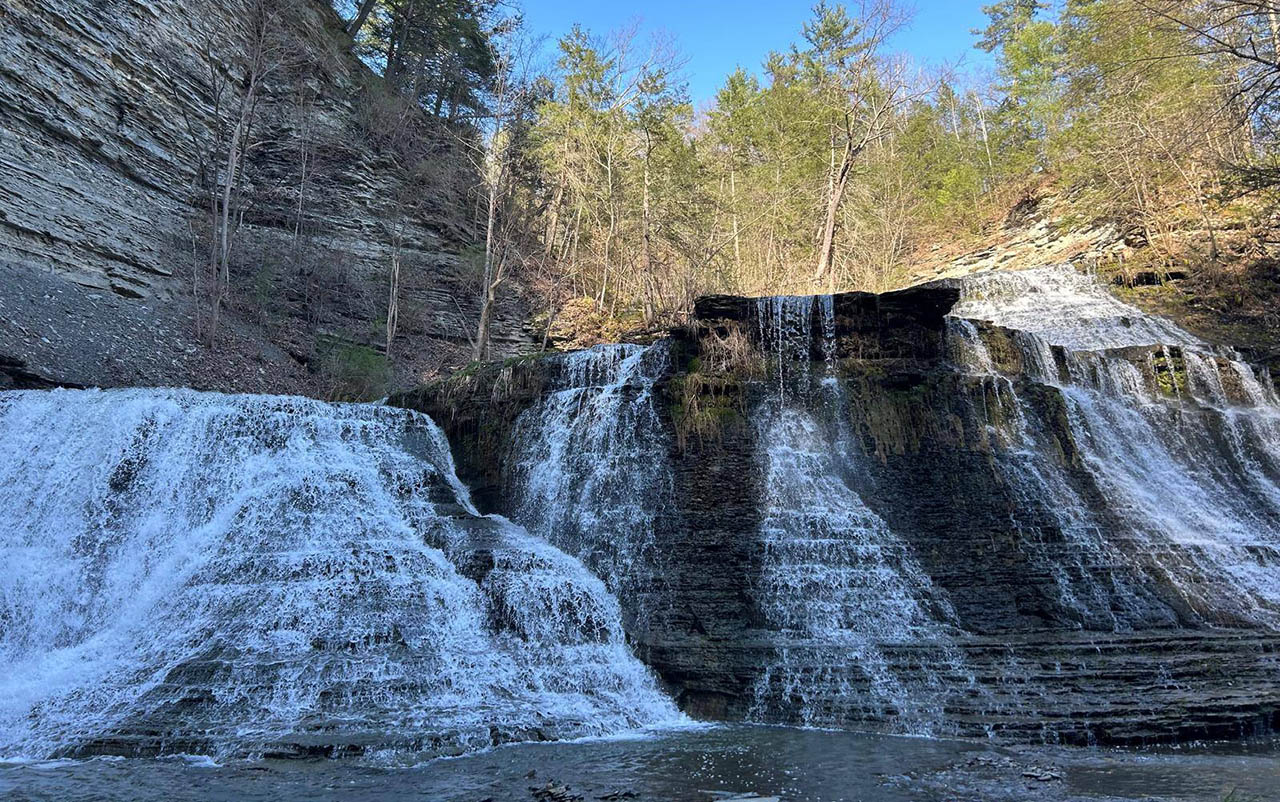 Waterfall and hiking trail at Sugar Creek Glen Campground in the Finger Lakes