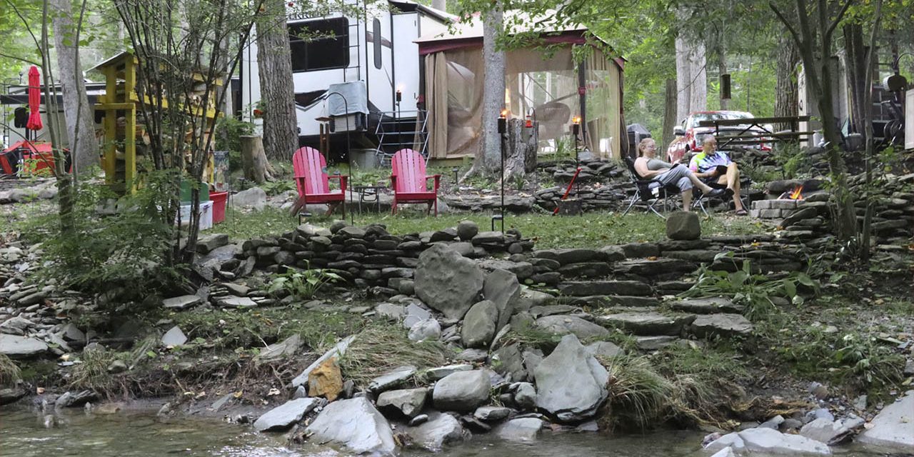 RV seasonal campsite setup in early spring at a New York campground with chairs and outdoor space