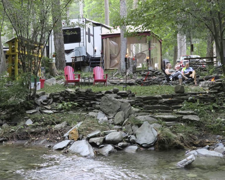 RV seasonal campsite setup in early spring at a New York campground with chairs and outdoor space