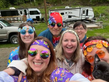 Group of campers enjoying a fun weekend at Sugar Creek Glen Camping in New York