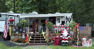 Seasonal campsite decorated for the holidays with lights and decorations at a campground
