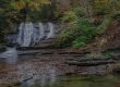 Spring waterfalls and forest scenery at Sugar Creek Glen Campground in the Finger Lakes region of New York